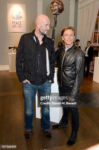 Jake Chapman and Jeremy Gilley attend the M16 Private View curated by Jake Chapman in support of Peace One Day at the Institute Of Contemporary Arts...