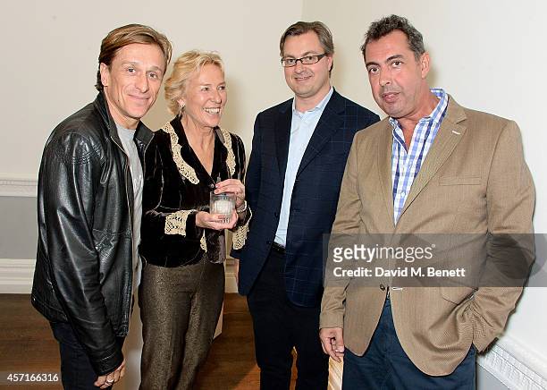 Jeremy Gilley and Sallie Ryle and guests attend the M16 Private View curated by Jake Chapman in support of Peace One Day at the Institute Of...