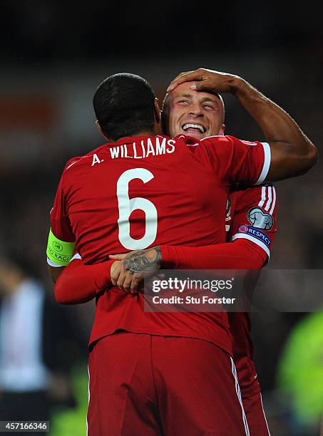 Wales player David Cotterill celebrates his opening goal with Ashley Williams during the EURO 2016 Qualifier match between Wales and Cyprus at...