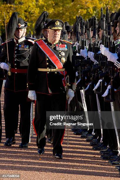 King Harald V of Norway inspects the honour guard during the first day of the state visit from India on October 13, 2014 in Oslo, Norway.