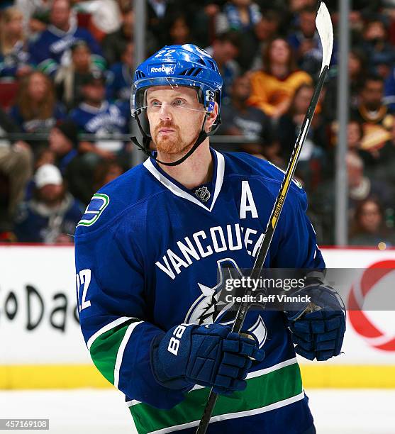 Daniel Sedin of the Vancouver Canucks skates up ice during their NHL game against the Edmonton Oilers at Rogers Arena October 11, 2014 in Vancouver,...