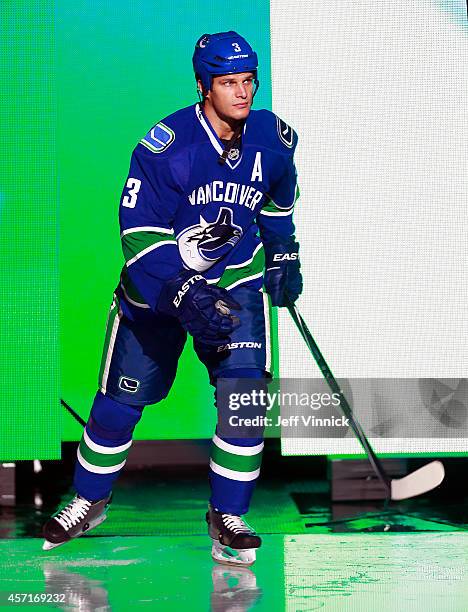 Kevin Bieksa of the Vancouver Canucks steps onto the ice during their NHL game against the Edmonton Oilers at Rogers Arena October 11, 2014 in...