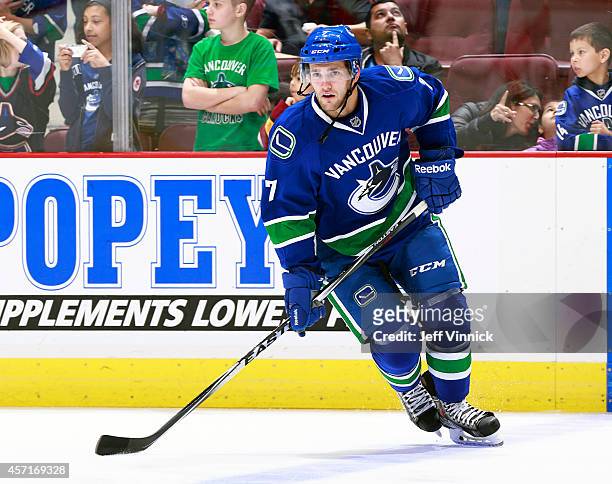 Linden Vey of the Vancouver Canucks skates up ice during their NHL game against the Edmonton Oilers at Rogers Arena October 11, 2014 in Vancouver,...