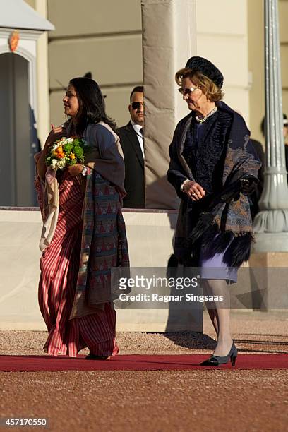 Daughter of the President of India Sharmistha Mukherjee and Queen Sonja of Norway attend the official welcoming ceremony at the Royal Palace during...