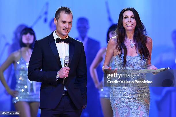 Michele Caliendo and Lorena Baricalla attend during the Golden Foot Award 2014 ceremony at Sporting Club on October 13, 2014 in Monte-Carlo, Monaco.