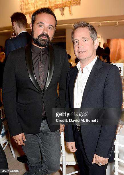 Evgeny Lebedev and Tom Hollander attend the launch party for Phillips European Headquarters at 30 Berkeley Square on October 13, 2014 in London,...