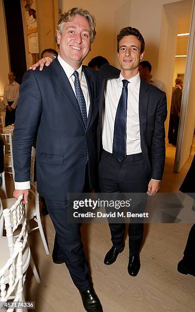 Tony McNerney and Henry Highley attend the launch party for Phillips European Headquarters at 30 Berkeley Square on October 13, 2014 in London,...