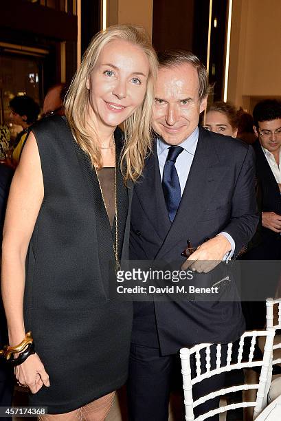 Michaela and Simon de Pury attend the launch party for Phillips European Headquarters at 30 Berkeley Square on October 13, 2014 in London, England.