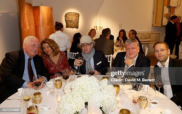 Nicolas Iljine, Alex Lachman and Nadim Samman attend the launch party for Phillips European Headquarters at 30 Berkeley Square on October 13, 2014 in...