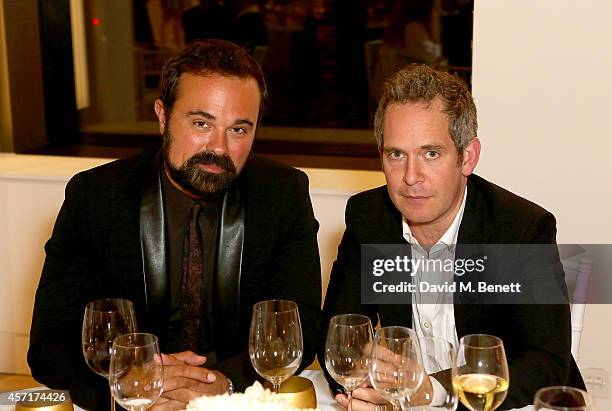 Evgeny Lebedev and Tom Hollander attend the launch party for Phillips European Headquarters at 30 Berkeley Square on October 13, 2014 in London,...