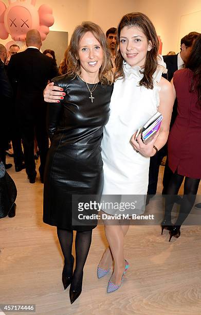 Maria Adonyeva and Svetlana Marich attends the launch party for Phillips European Headquarters at 30 Berkeley Square on October 13, 2014 in London,...