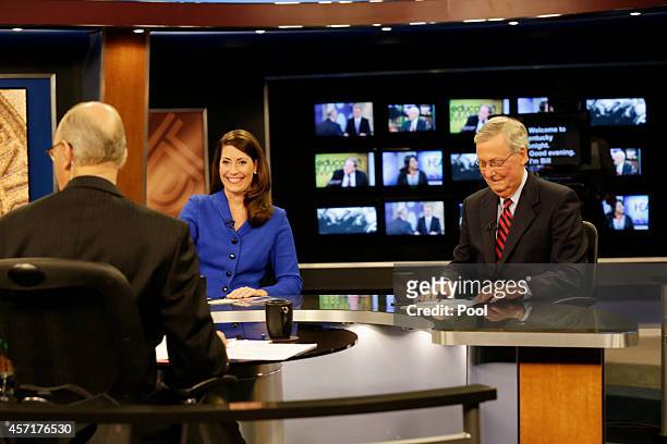 Minority Leader U.S. Sen. Mitch McConnell and Kentucky Secretary of State Alison Lundergan Grimes rehearse with host Bill Goodman before their debate...