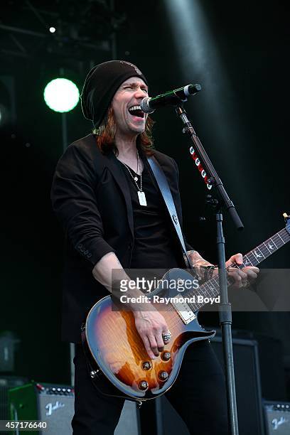 Miles Kennedy from Alter Bridge performs during the "Louder Than Life" Music Festival in Champions Park on October 04, 2014 in Louisville, Kentucky.