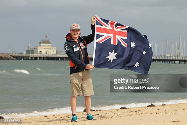Australia's future star of MotoGP Jack Miller poses with the Australian flag after cooking an Aussie BBQ on the foreshore of St Kilda Sea Baths on...