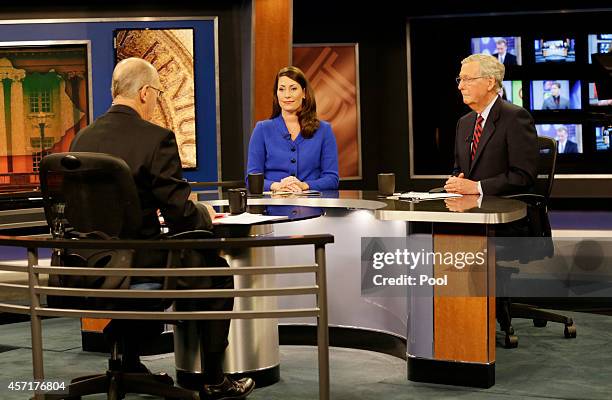 Minority Leader U.S. Sen. Mitch McConnell and Kentucky Secretary of State Alison Lundergan Grimes rehearse with host Bill Goodman before their debate...