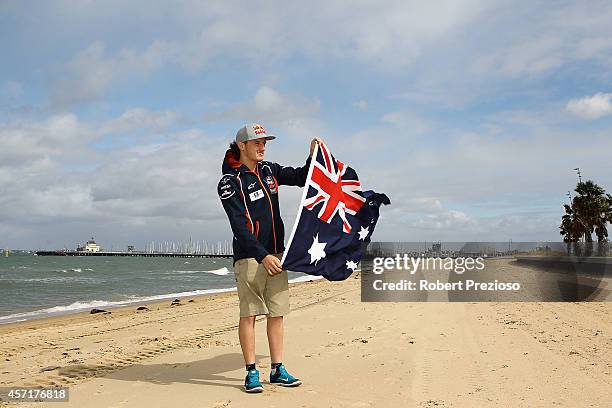 Australia's future star of MotoGP Jack Miller poses with the Australian flag after cooking an Aussie BBQ on the foreshore of St Kilda Sea Baths on...