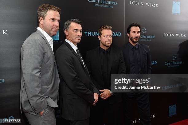 Producer Basil Iwanyk, directors Chad Stahelski and David Leitch and actor Keanu Reeves attend the "John Wick" New York Premiere at Regal Union...