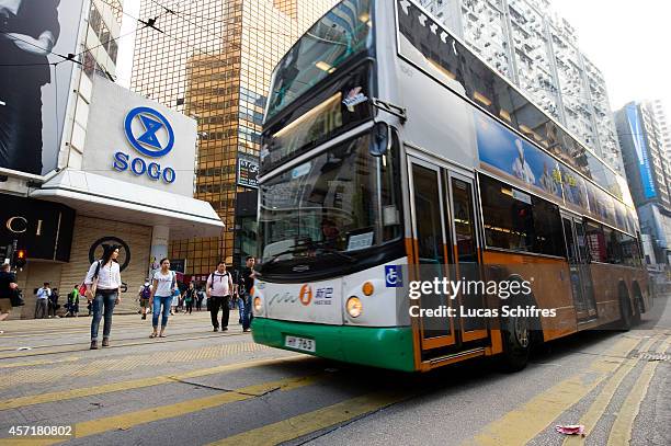 The police re-opened traffic lanes in Causeway Bay and this bus is among the first ones to use it in front of Sogo, Causeway Bay on October 14, 2014...