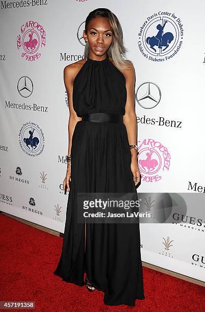 Elisa Johnson attends the 2014 Carousel of Hope Ball at The Beverly Hilton Hotel on October 11, 2014 in Beverly Hills, California.