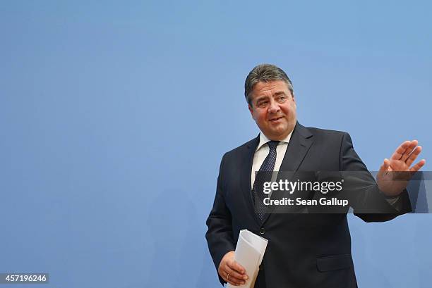 German Vice Chancellor and Economy and Energy Minister Sigmar Gabriel departs after presenting the German government's revised economic outlook on...