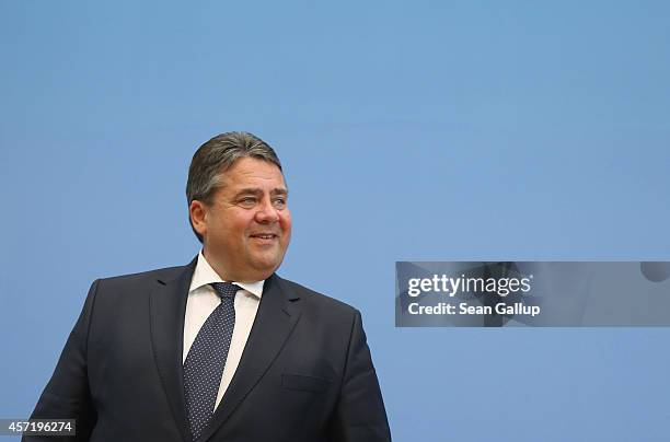 German Vice Chancellor and Economy and Energy Minister Sigmar Gabriel departs after presenting the German government's revised economic outlook on...