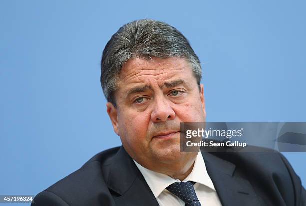 German Vice Chancellor and Economy and Energy Minister Sigmar Gabriel presents the German government's revised economic outlook on October 14, 2014...