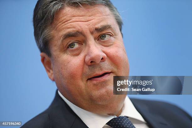 German Vice Chancellor and Economy and Energy Minister Sigmar Gabriel presents the German government's revised economic outlook on October 14, 2014...