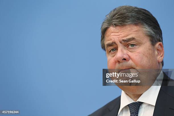 German Vice Chancellor and Economy and Energy Minister Sigmar Gabriel presents the German government's revised economic outlook on October 14, 2014...