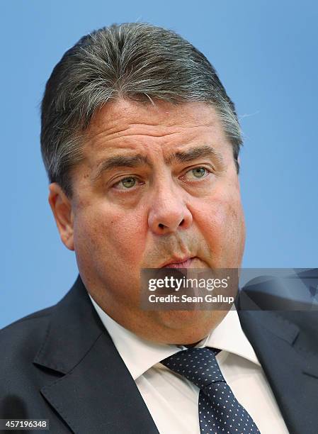 German Vice Chancellor and Economy and Energy Minister Sigmar Gabriel presents the German government's revised economic outlook on October 14, 2014...