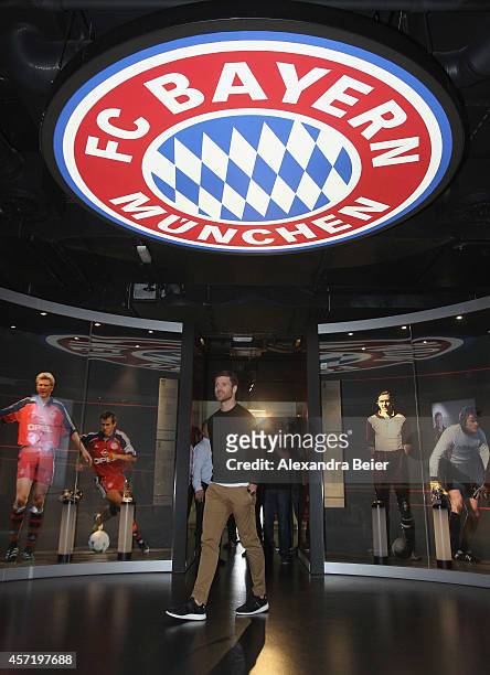 Bayern Muenchen player Xabi Alonso visits the FC Bayern Erlebniswelt museum at Allianz Arena on October 14, 2014 in Munich, Germany.
