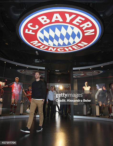 Bayern Muenchen player Xabi Alonso visits the FC Bayern Erlebniswelt museum at Allianz Arena on October 14, 2014 in Munich, Germany.