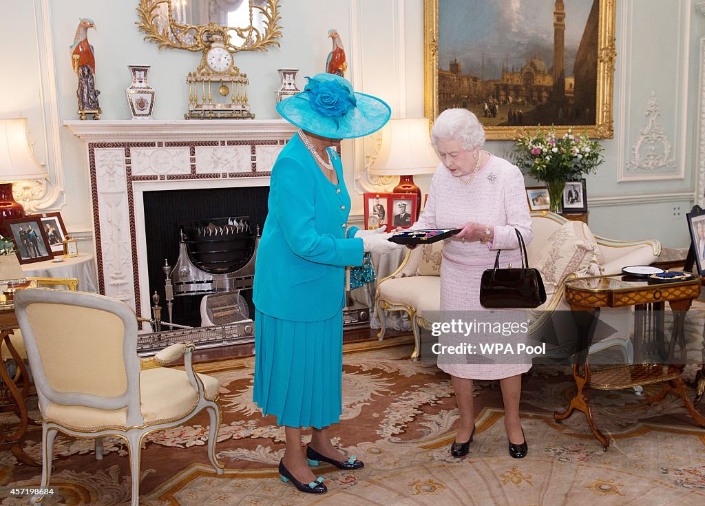 Queen Elizabeth II Holds An Audience With Dame Marguerite Pindling