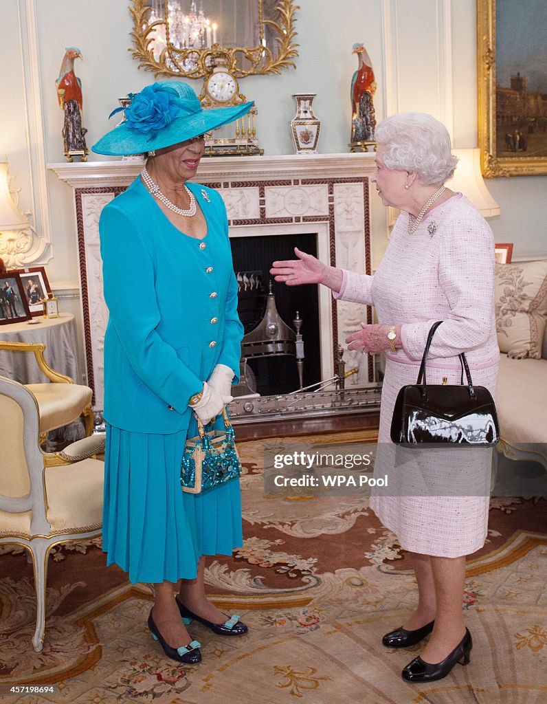 Queen Elizabeth II Holds An Audience With Dame Marguerite Pindling