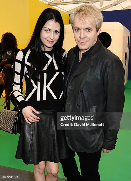 Nefer Suvio and Nick Rhodes attend VIP Preview of the Frieze Art Fair 2014 in Regent's Park on October 14, 2014 in London, England.