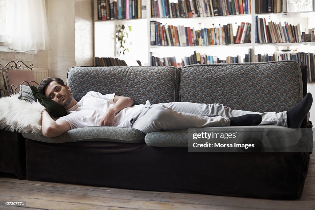 Man sleeping on sofa