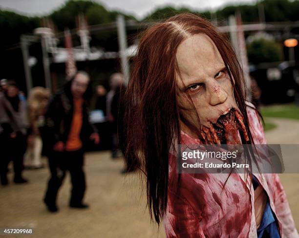 Actors characterized as zombies scare journalists during the presentation of 'The Walking Dead Experience' fairground attraction at Parque de...