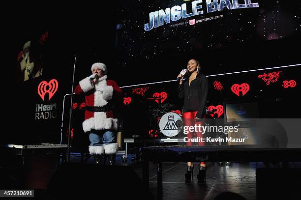 Hot 99.5's Toby Knap and Hot 99.5's Danni of The Kane Show perform onstage during Hot 99.5s Jingle Ball 2013, presented by Overstock.com, at Verizon...