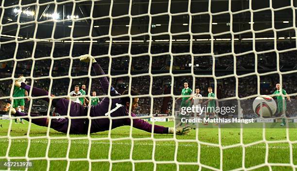 David Forde of the Republic of Ireland dives in vain as Toni Kroos of Germany scores the opening goal during the EURO 2016 Qualifier between Germany...