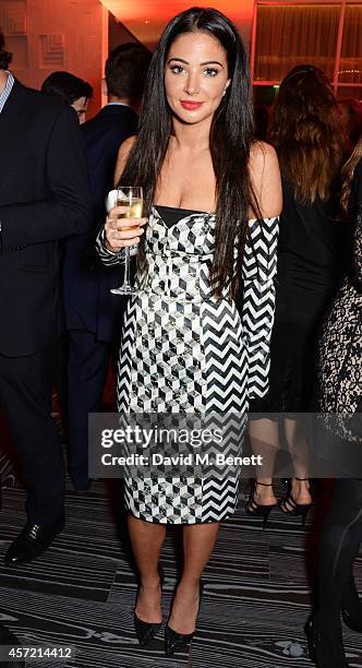 Tulisa Contostavlos attends a party hosted by Jonathan Shalit to celebrate his OBE at Avenue on October 14, 2014 in London, England.