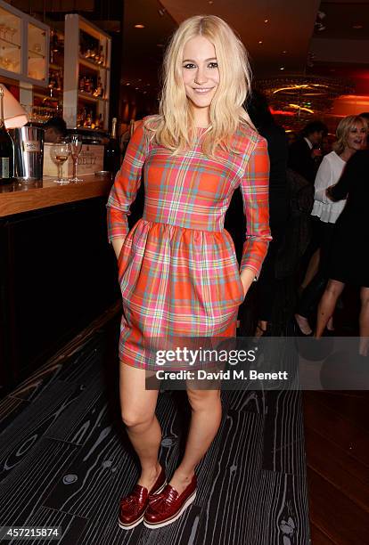 Pixie Lott attends a party hosted by Jonathan Shalit to celebrate his OBE at Avenue on October 14, 2014 in London, England.