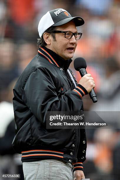 Comedian/actor Rob Schneider speaks to the fans before the San Francisco Giants take on the St. Louis Cardinals before Game Three of the National...