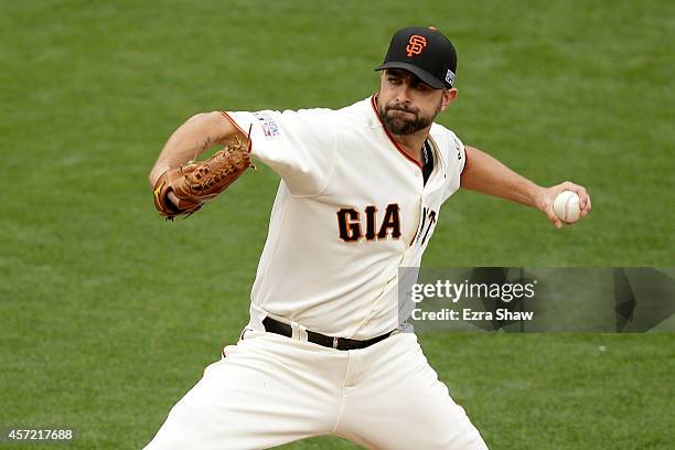 Jeremy Affeldt of the San Francisco Giants pitches in the seventh inning against the St. Louis Cardinals during Game Three of the National League...