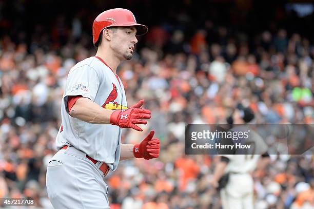Randal Grichuk of the St. Louis Cardinals rounds the bases after hitting a solo home run in the seventh inning off Tim Hudson of the San Francisco...