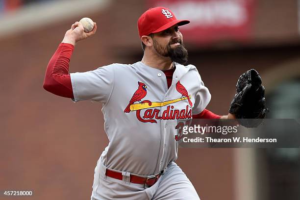 Pat Neshek of the St. Louis Cardinals pitches in the eighth inning against the San Francisco Giants during Game Three of the National League...