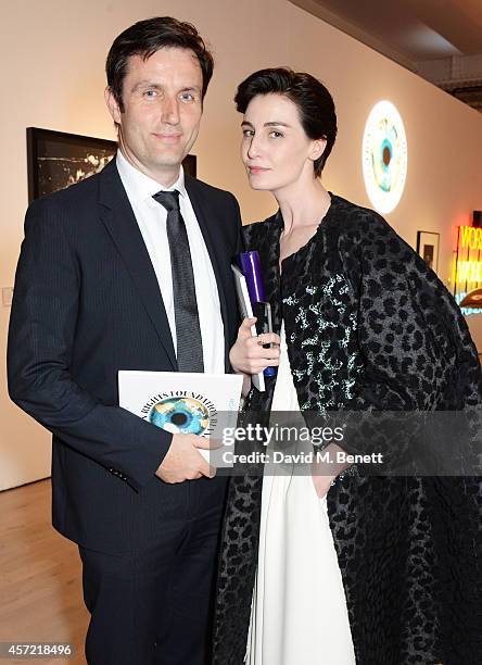 Stephen Gibson and Erin O'Connor attend the Bianca Jagger Human Rights Foundation "Arts for Human Rights" benefit gala auction at Phillips Gallery on...