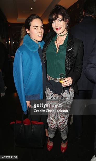Tallulah Harlech and Jasmine Guinness attend a dinner at China Tang after Moncler Hosted the 'Monuments' Exhibition with Leica on October 14, 2014 in...
