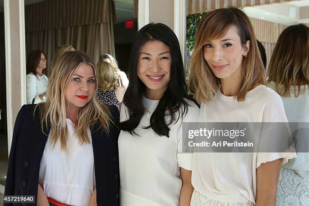 Emily Current, Joyce Chang, and Meritt Elliott attend SELF Joyce Chang, Jessica Alba Caley Yavorsky and Allyson Felix Luncheon on October 14, 2014 in...