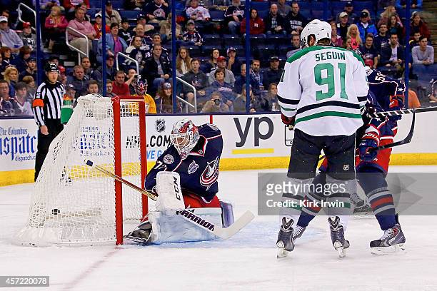 Tyler Seguin of the Dallas Stars beats Sergei Bobrovsky of the Columbus Blue Jackets for a goal during the first period on October 14, 2014 at...