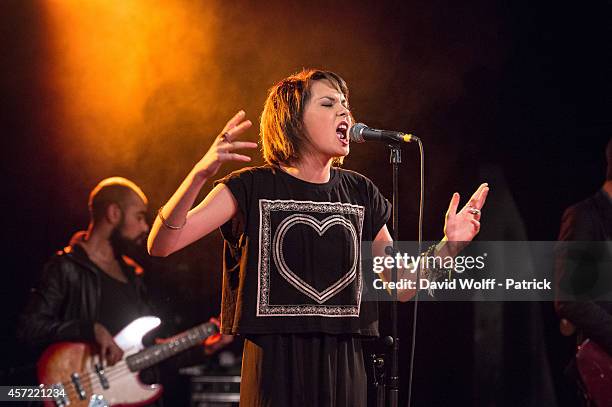 Sophie Tith Charvet performs during private showcase at Divan du Monde on October 14, 2014 in Paris, France.