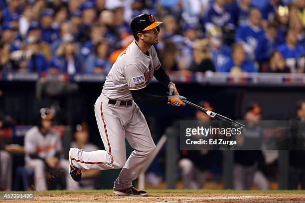 Hardy of the Baltimore Orioles hits an RBI double to right field to score Steve Pearce in the second inning against Jeremy Guthrie of the Kansas City...
